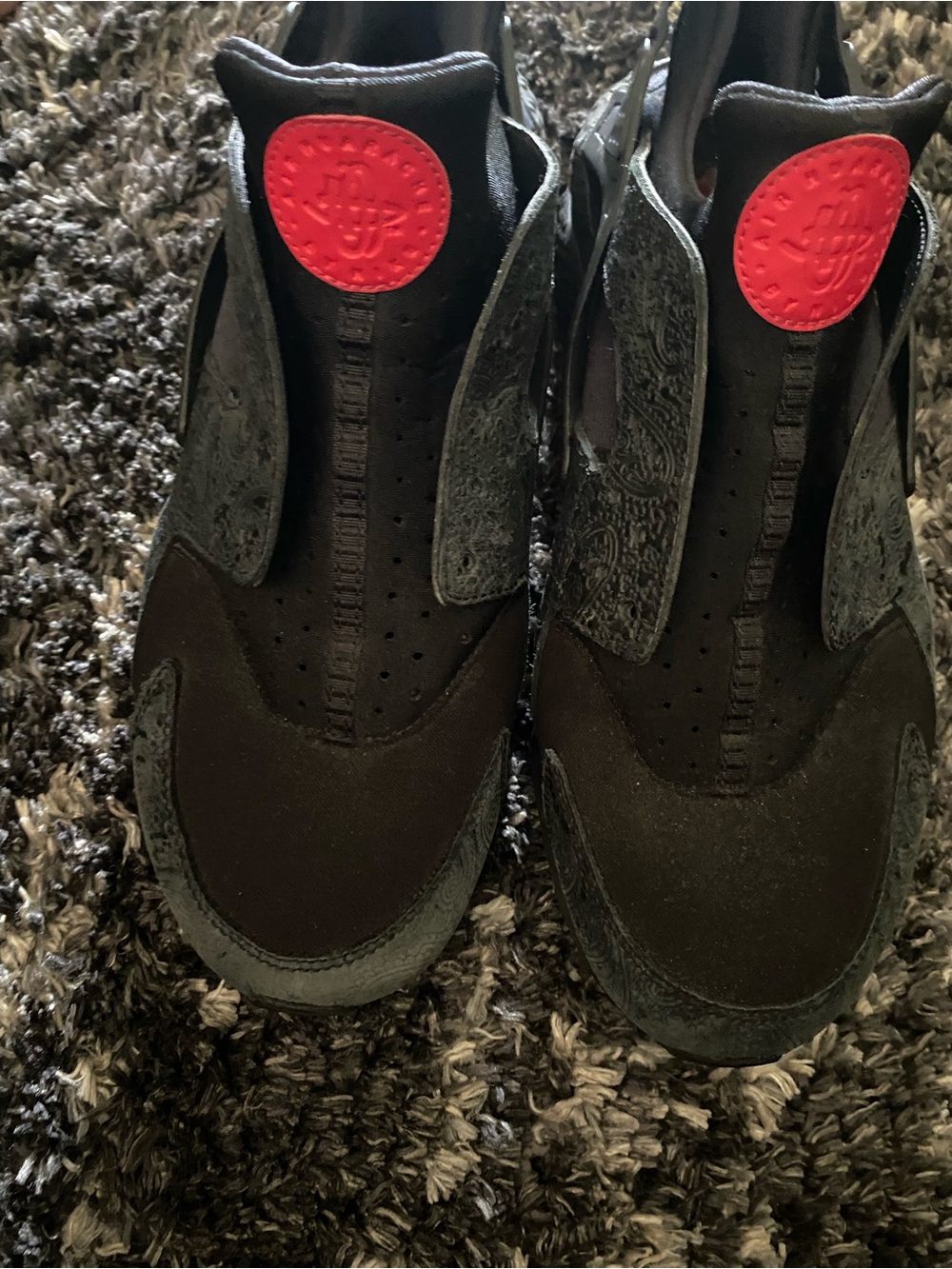 Nike Men's Black Sneakers with Red Logo Accent